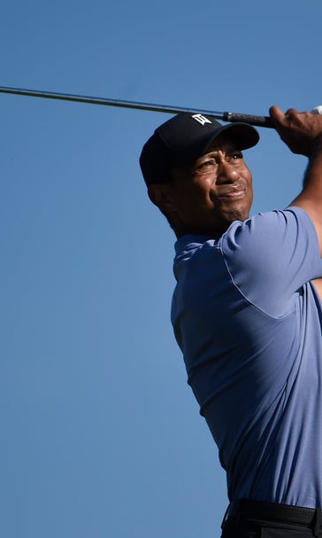 Woods opens with 69 at Torrey North to start new year